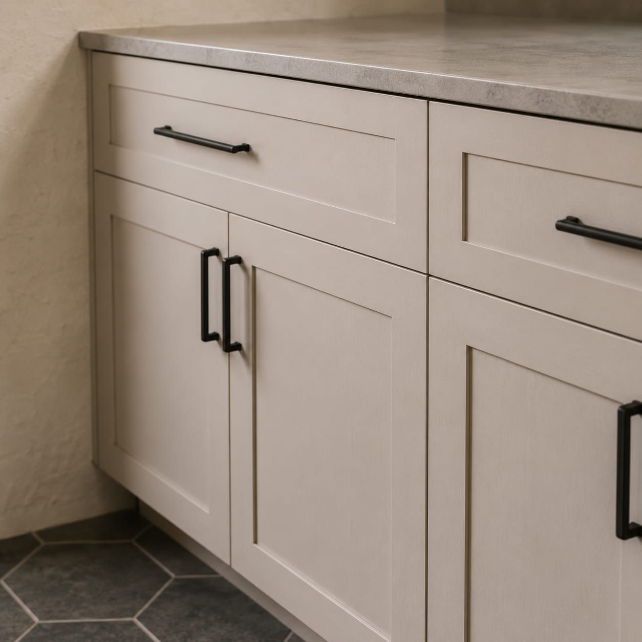 A row of finished cabinet doors showing even gaps after adjustment